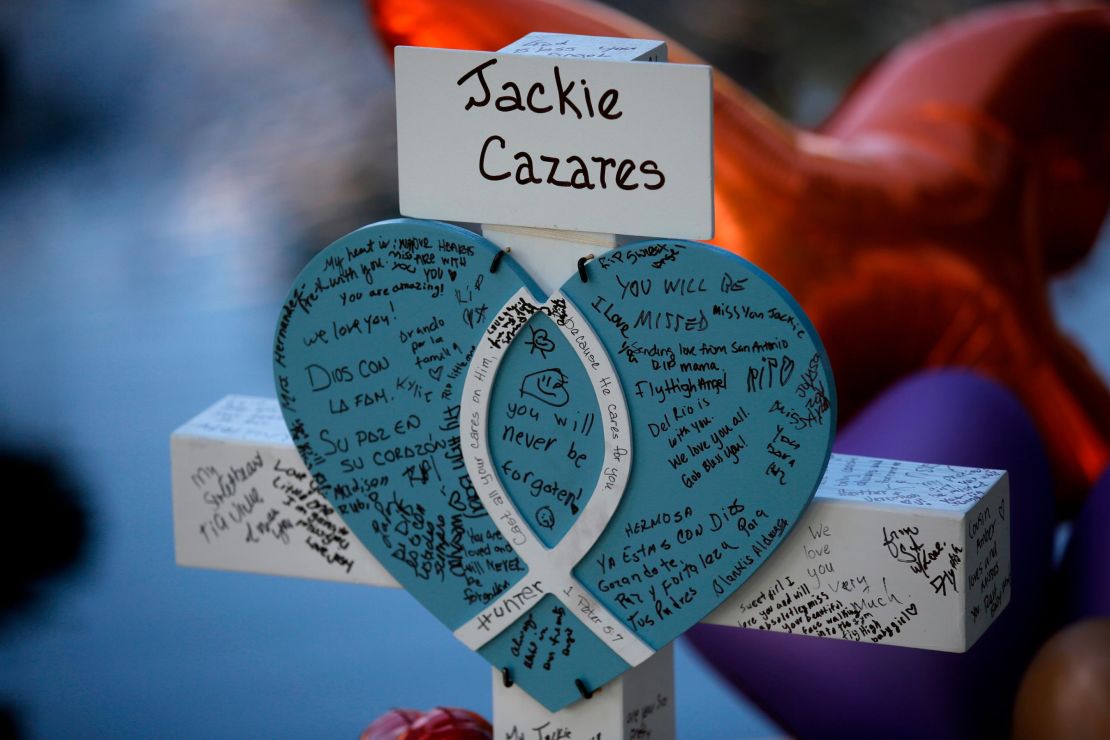 A cross for Jacklyn Cazares stands at a memorial site for the victims killed in the shooting at Robb Elementary School in Uvalde, Texas.