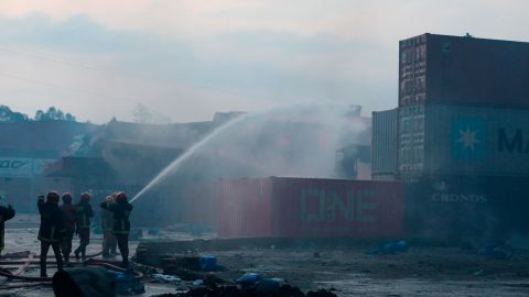 Firefighters work to contain a fire that broke out at the BM Inland Container Depot, a Dutch-Bangladeshi joint venture, in Chittagong, Bangladesh on June 5, 2022.
