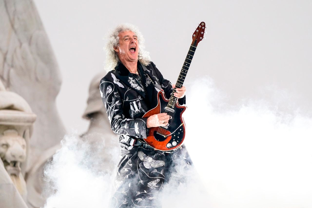 Queen's Brian May delights concertgoers as the band — joined by Adam Lambert — opens a special show outside of Buckingham Palace on Saturday night. The two-and-a-half hour concert boasted an impressive lineup of stars.