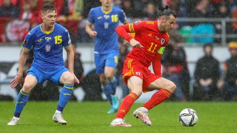 Gareth Bale (right) saw his deflected free-kick give Wales the lead against Ukraine. 