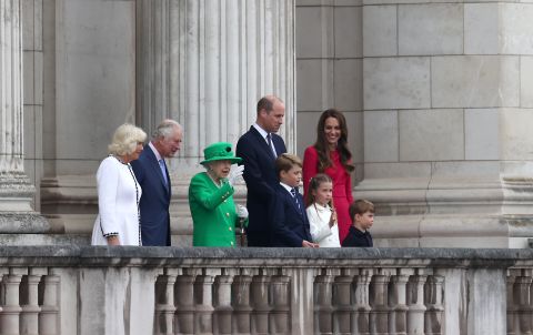 The Queen is joined by members of the royal family during her balcony appearance on Sunday. With her, from left, are Camilla, the Duchess of Cornwall; Prince Charles; Prince William; Prince George; Princess Charlotte; Catherine, the Duchess of Cambridge; and Prince Louis.