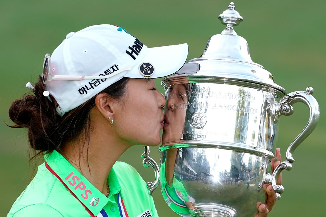 Minjee Lee kisses the Harton S. Semple Trophy after she won the final round of the US Women's Open golf tournament.