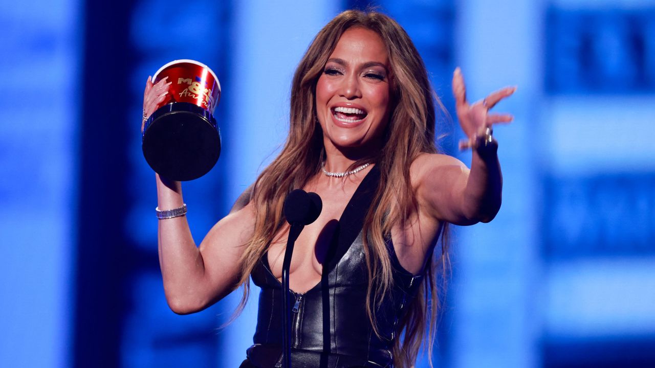 Jennifer Lopez accepts the best song award for "On My Way" at Sunday's MTV Movie & TV Awards.