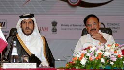 Qatar's Minister of Commerce and Industry Mohammed Bin Hamad al-Thani (left) and India's Vice President Venkaiah Naidu (right) take part in a business forum in Doha on June 5. 