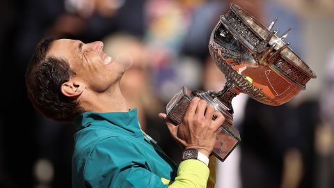 Nadal holds aloft La Coupe des Mousquetaires (The Musketeers' Trophy) at Roland Garros. 