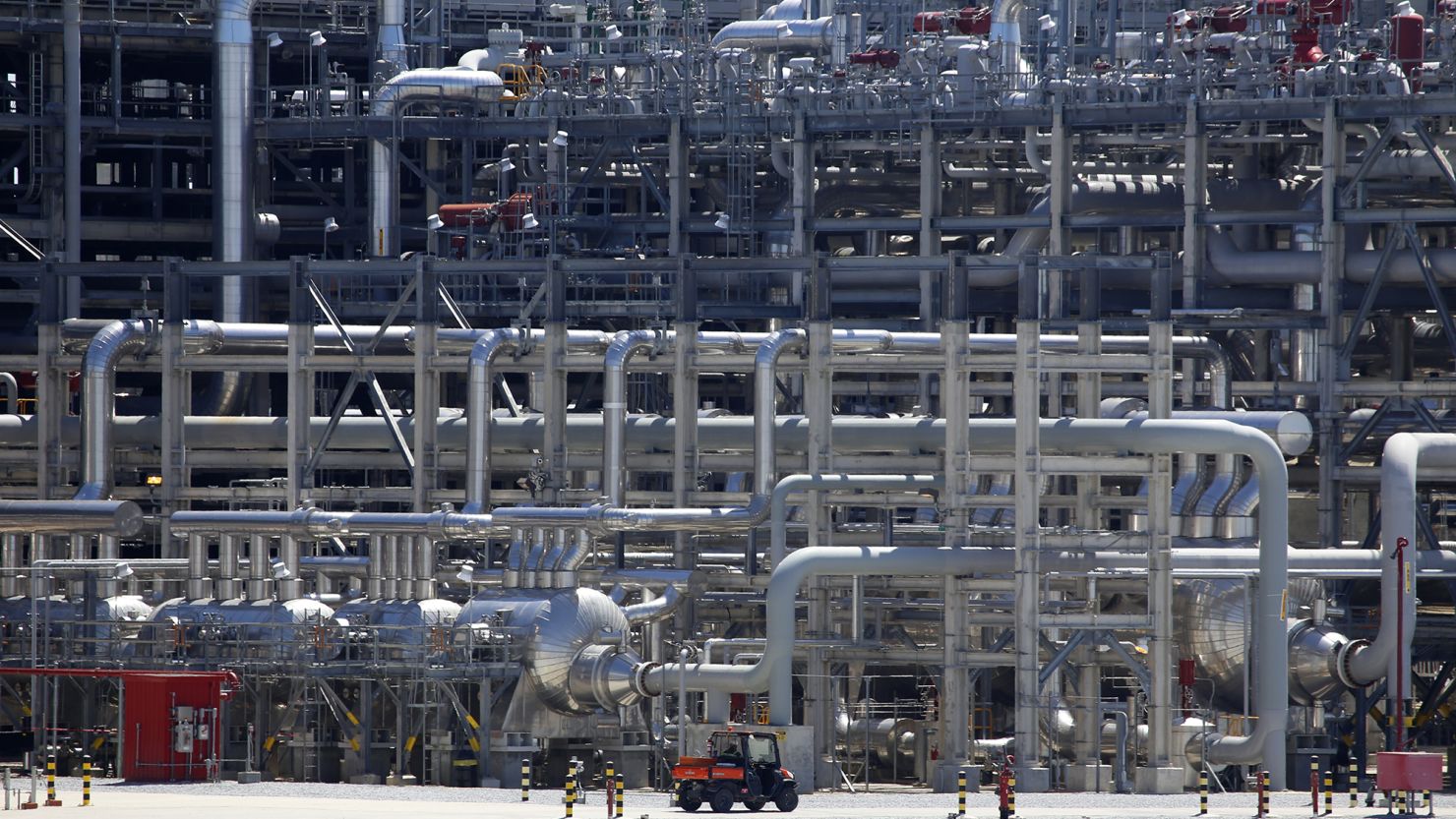 A small vehicle drives past a network of piping that makes up pieces of a "train" at Cameron LNG export facility in Hackberry, La., on Thursday, March 31, 2022. Natural gas is cooled at the facility and turned into liquid and sent on massive ships to many parts of the world. Once it arrives at its destination, the liquified natural gas is re-gasified and piped to homes, factories and other places. Demand for natural gas worldwide has been greater than ever since Russia, another major natural gas exporter, invaded Ukraine.