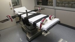 FILE - This photo shows the gurney in the the execution chamber at the Oklahoma State Penitentiary in McAlester, Okla., on Oct. 9, 2014. A federal judge in Oklahoma on Monday, June 6, 2022, ruled the state's three-drug lethal injection method is constitutional, paving the way for the state to request execution dates for more than two dozen death row inmates who were plaintiffs in the case. (AP Photo/Sue Ogrocki, File)