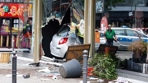 The driver was detained after ploughing into a shop front in Berlin's Charlottenburg district.