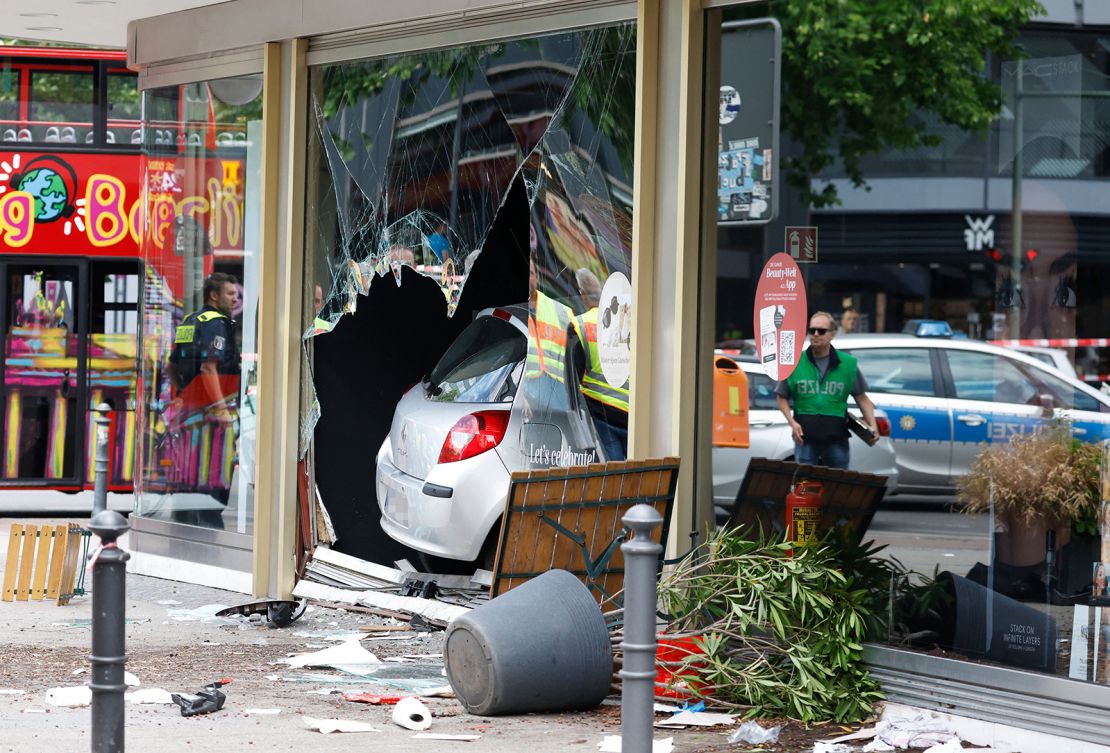 The driver was detained after ploughing into a shop front in Berlin's Charlottenburg district.