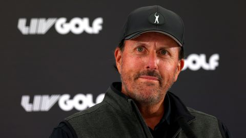 Mickelson looks on during a press conference.