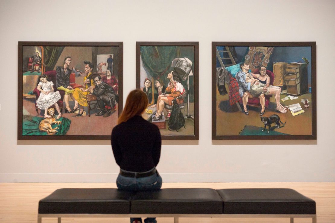 A visitor looks at Paula Rego's "The Betrothal: Lessons: The Shipwreck, after 'Marriage a la Mode' by Hogarth" at Tate Britain.