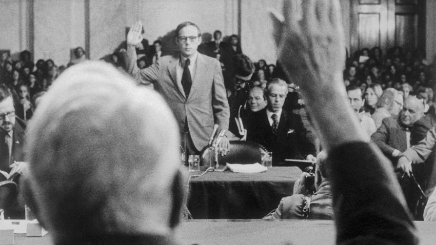 (Original Caption) John W. Dean III, the fired White House Counsel, is sworn in 6/25 as the Senate Watergate Committee resumes its investigation of the Watergate affair. Senator Sam Ervin, Democrat-North Carolina, chairman of the committee administers the oath.