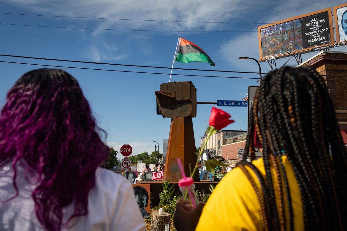 A flag flies at George Floyd Square during a Juneteenth celebration in Minneapolis, Minnesota on Saturday, June 19, 2021. 