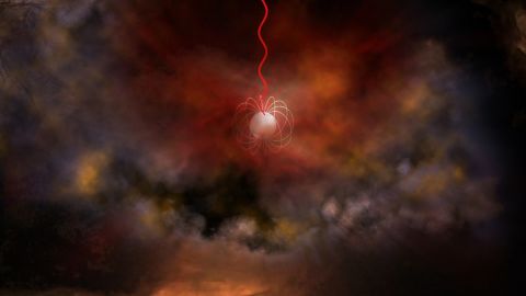 Esta es la vista de un artista de una estrella de neutrones con un campo magnético ultrasónico conocido como campo magnético que emite ondas de radio (en rojo). 