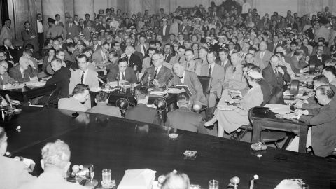 The Senate Caucus Room as the Army-McCarthy hearings were resumed after a week's research, on May 24, 1954 in Washington, DC. On the witness stand (left to right), James St. Clair, assistant army counselor; Army Secretary Robert T. Stevens; and Joseph Welch, Army counsel.