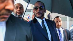 Mandatory Credit: Photo by TANNEN MAURY/EPA-EFE/Shutterstock (10230483k)R&B singer R. Kelly (C) looks for his vehicle as he leaves court at the Leighton Criminal Courts building after a status hearing on his sexual assault charges in Chicago, Illinois, USA, 07 May 2019. Kelly, through his attorney, is reportedly challenging evidence provided in two video tapes that allegedly show him having sex with a 14 year old girl.R. Kelly in court, Chicago, USA - 07 May 2019