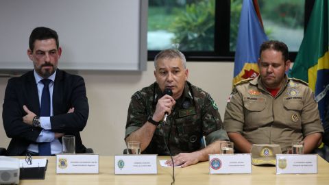 Gen. Placido (center) speaks between Eduardo Alexandre Fontes (right), Regional Superintendent of Amazonas State Federal Police and Col. Muniz during a news conference in Manaus, Brazil, on Wednesday.