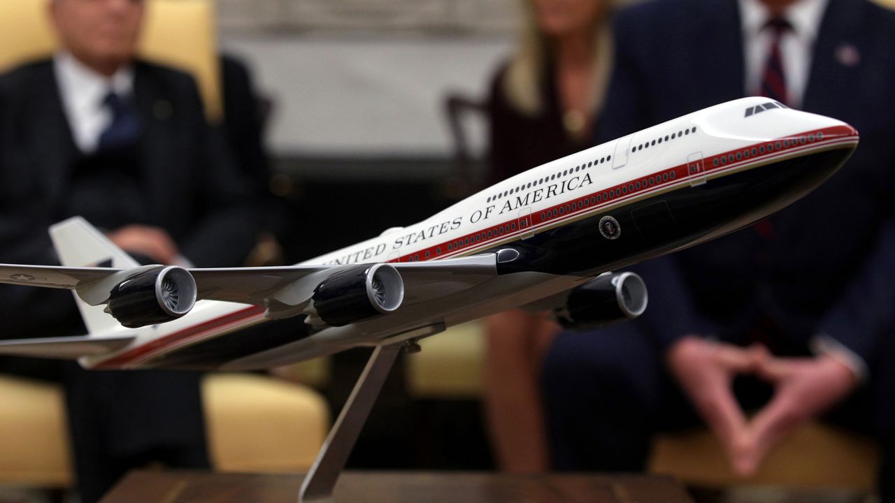 A model of the proposed paint scheme of the next generation of Air Force One is on display during a meeting between U.S. President Donald Trump and President Sergio Mattarella of Italy in the Oval Office of the White House October 16, 2019 in Washington, DC.