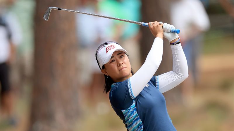 NextImg:Danielle Kang to take a break from golf after playing with spinal tumor | CNN