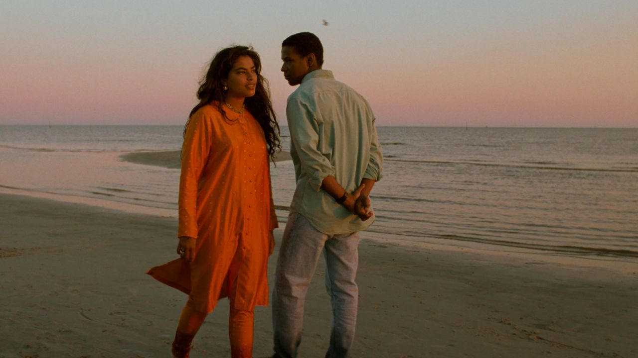 Choudhury and Washington walk along the beach in "Mississippi Masala."