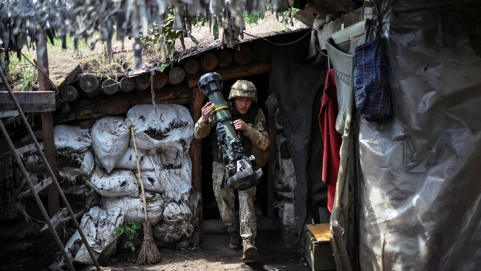 A Ukrainian soldier holds a next generation light anti-tank weapon (NLAW) at a position on the front line near Bakhmut in the Donbas region of Ukraine on June 5.
