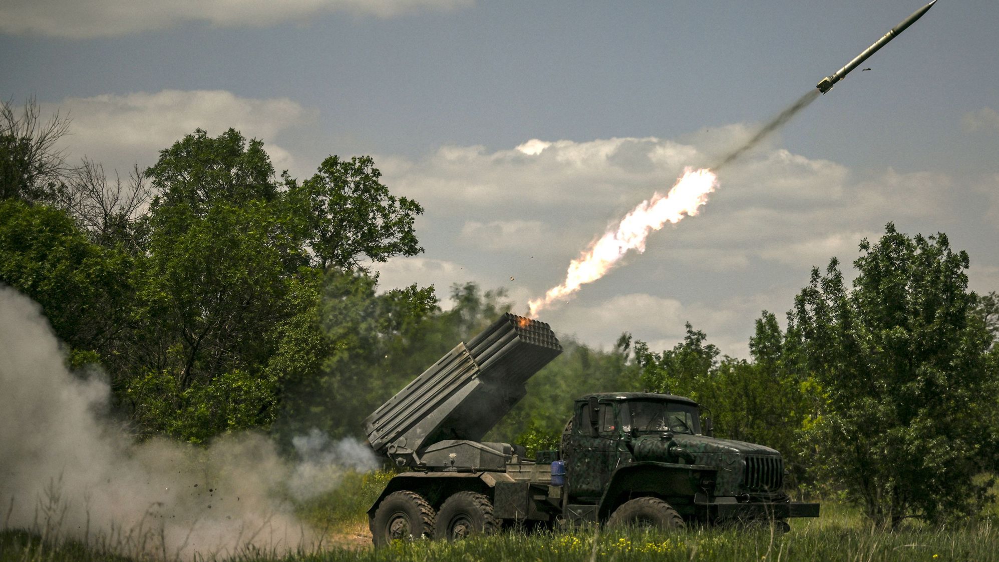 Ukrainian troops fire surface-to-surface rockets from <a href="https://edition.cnn.com/2022/05/26/politics/us-long-range-rockets-ukraine-mlrs/index.html" target="_blank">MLRS</a> towards Russian positions at the front line in the eastern Ukrainian region of Donbas on June 7.