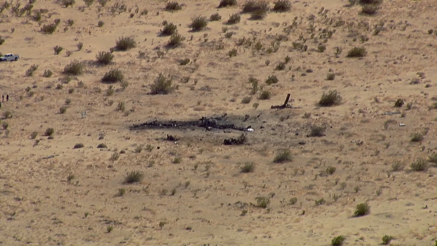 Personnel arrive near the scene where a US Marine MV-22B Osprey crashed near Glamis, California, on June 8.