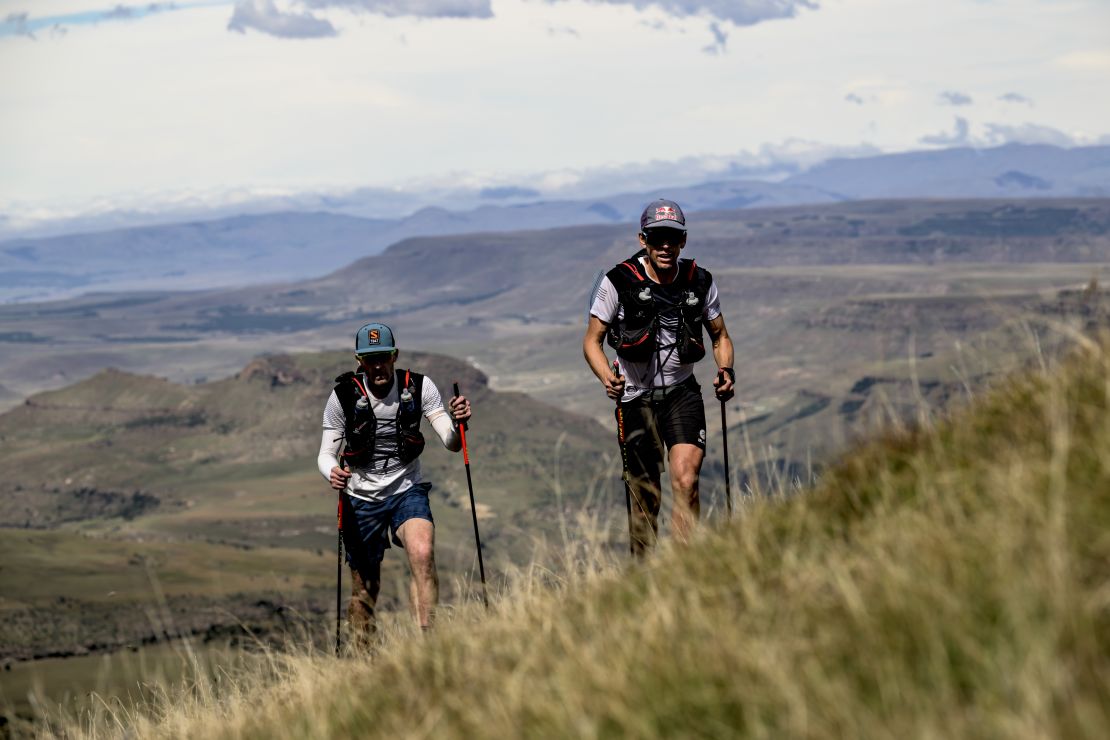 Sandes and Griesel look forward to spending more time on their home continent. Here they're pictured trekking up a steep incline during their Navigate Lesotho run.
