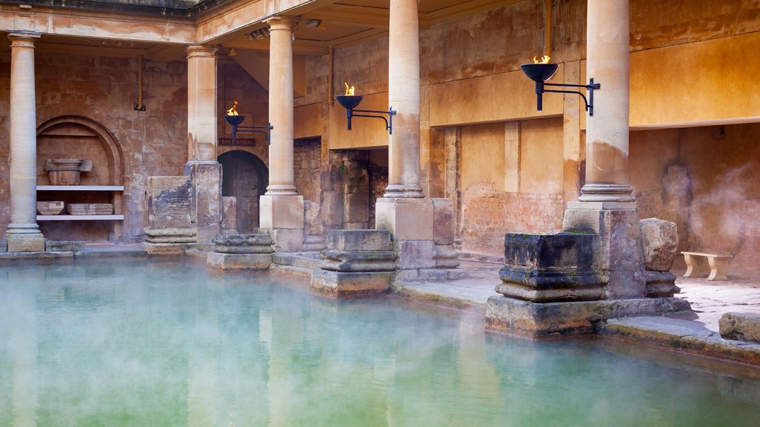 <strong>8. The Roman Baths:</strong> Steam rises off the hot mineral water in the Great Bath, part of the Roman Baths in Bath, United Kingdom.