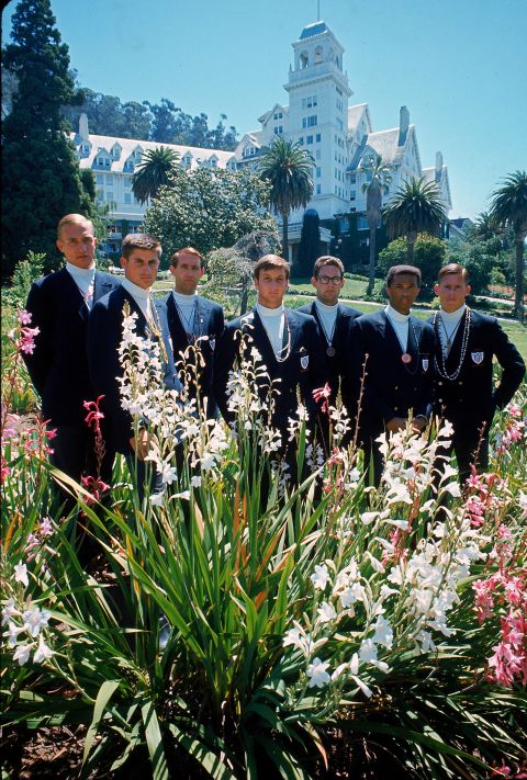 Ashe poses with other Davis Cup team members for a portrait in 1968.