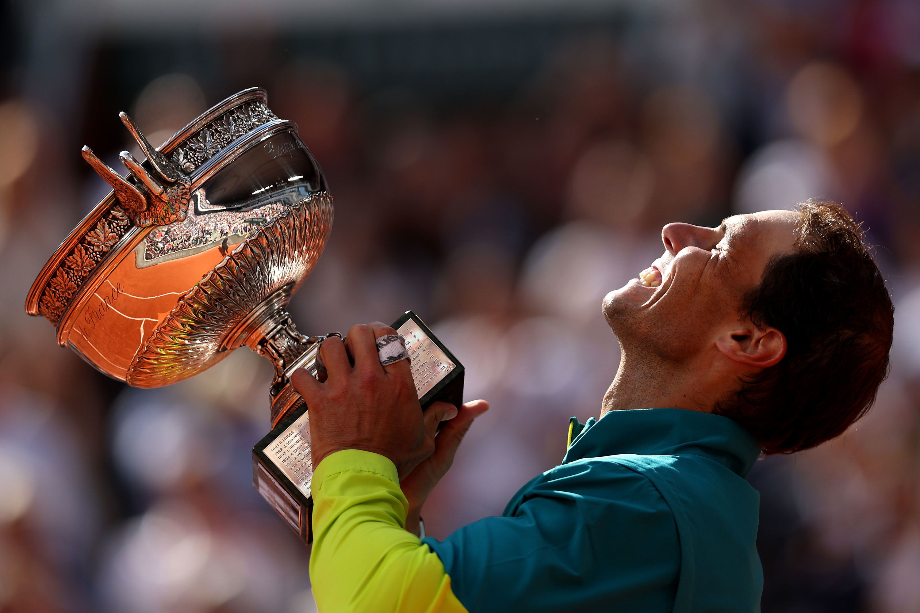 Rafael Nadal celebrates with the French Open trophy after defeating Casper Ruud in the final on Sunday, June 5.