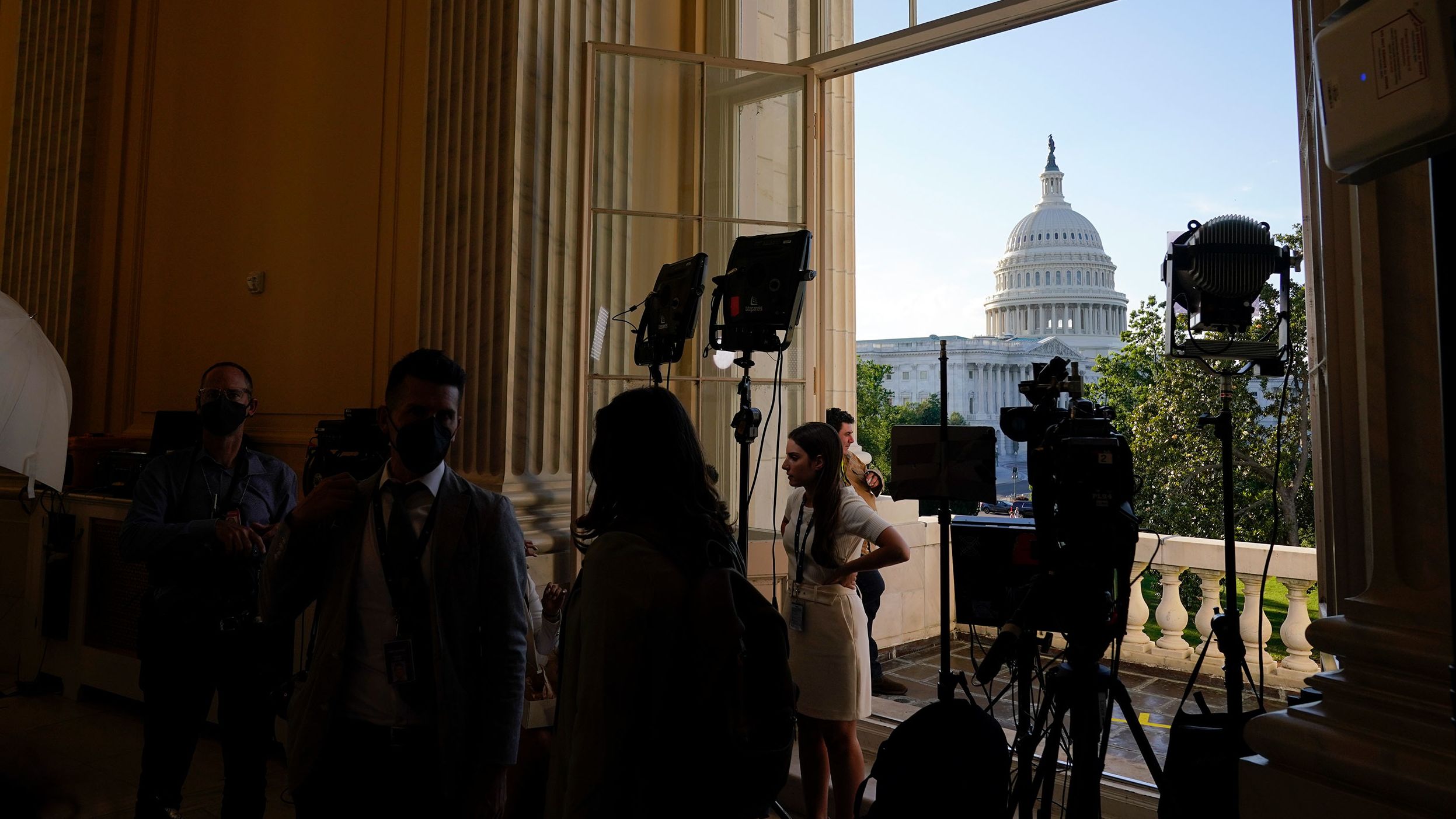 Media members gather on Capitol Hill before the first hearing.