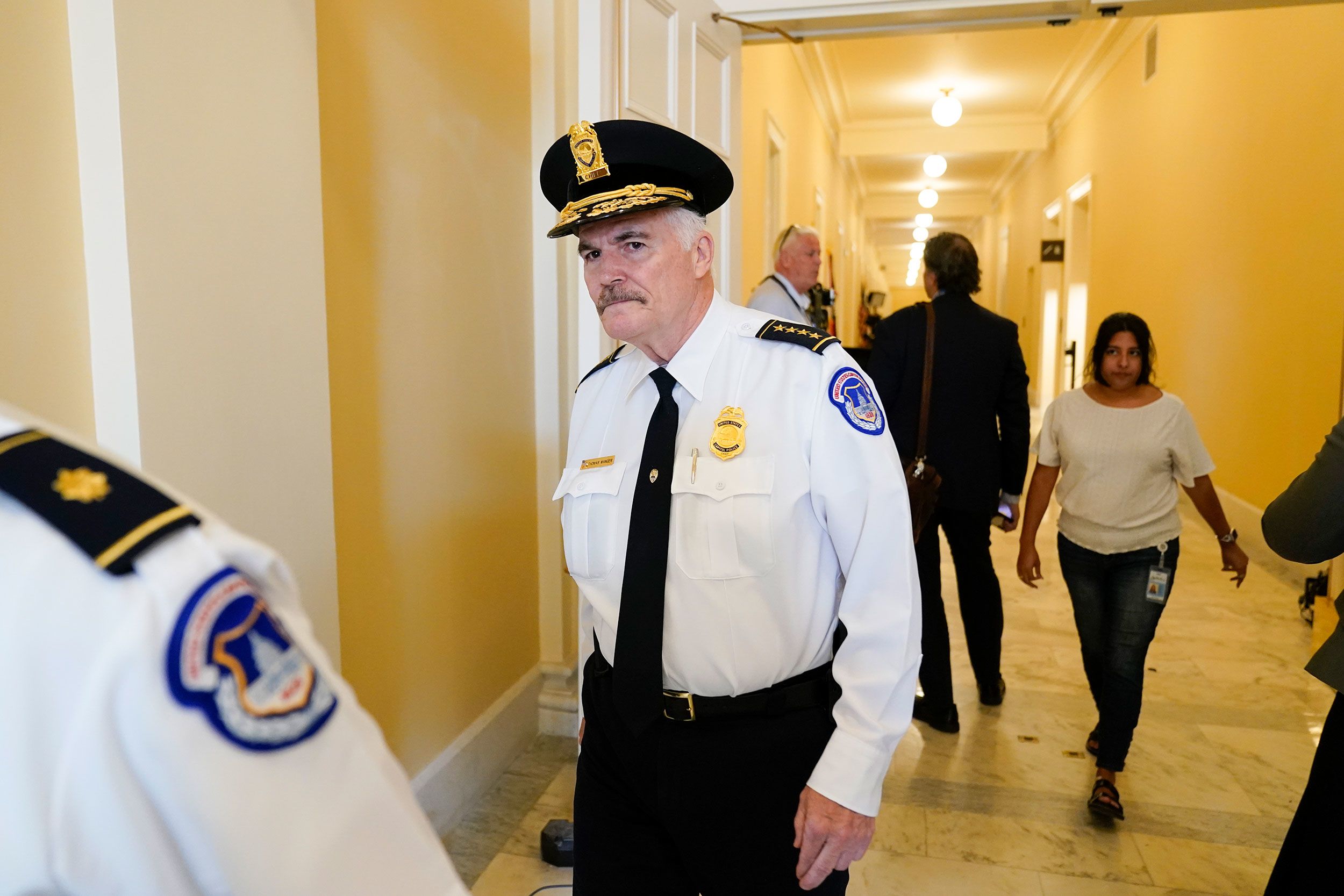 US Capitol Police Chief Tom Manger walks outside the hearing room on June 9.