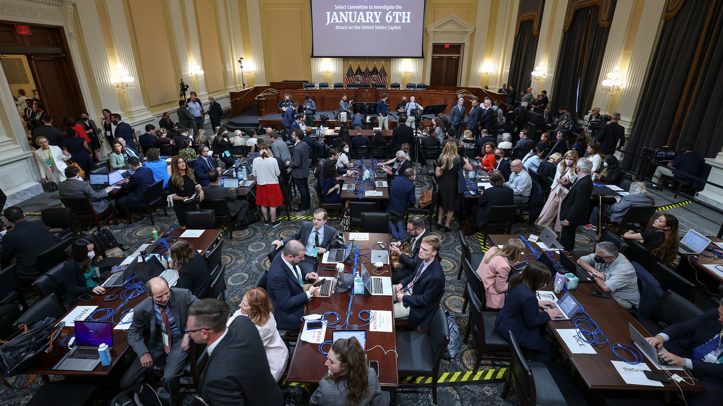 Members of the media set up prior to the prime-time hearing on June 9.