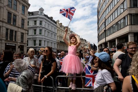 Elena Parejo-Pelaez, 5, stands outside St Paul's Cathedral in London on Friday, June 3, hoping to catch a glimpse of the royal family during the Queen's Platinum Jubilee. 