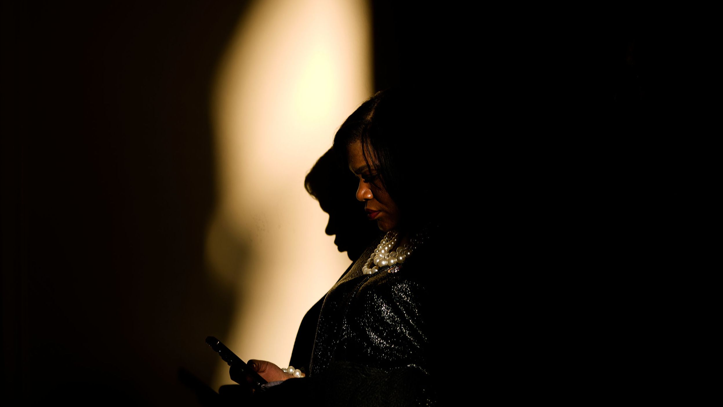 US Rep. Cori Bush waits to attend the start of the first hearing.
