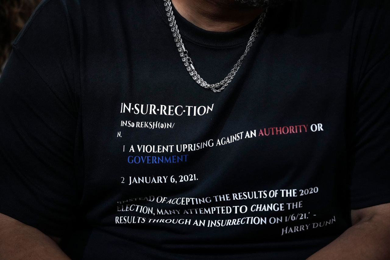 Dunn's shirt carried the definition of insurrection.