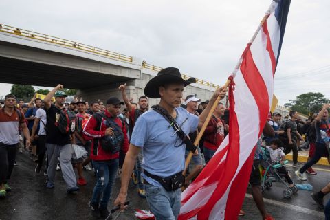 Roberto Marquez, a Mexican painter who lives between Mexico and the United States, joins a migrant caravan leaving the city of Tapachula, Mexico, on Monday, June 6. Marquez said he has accompanied other caravans since 2018.