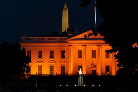 The White House is illuminated with orange lights in honor of National Gun Violence Awareness Day on Friday, June 3. <a href=
