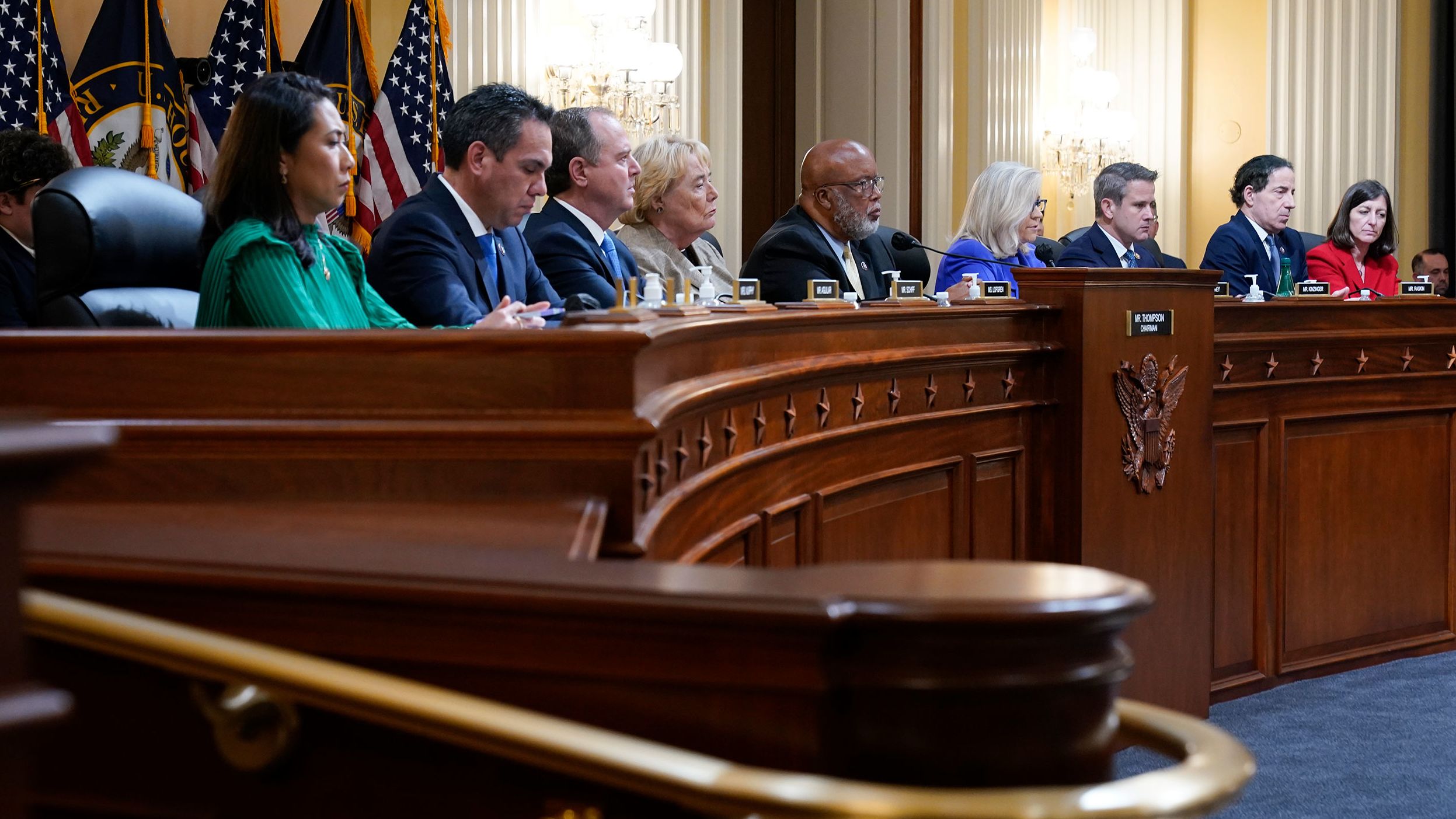 The House select committee is seated at the start of the hearing on June 9.
