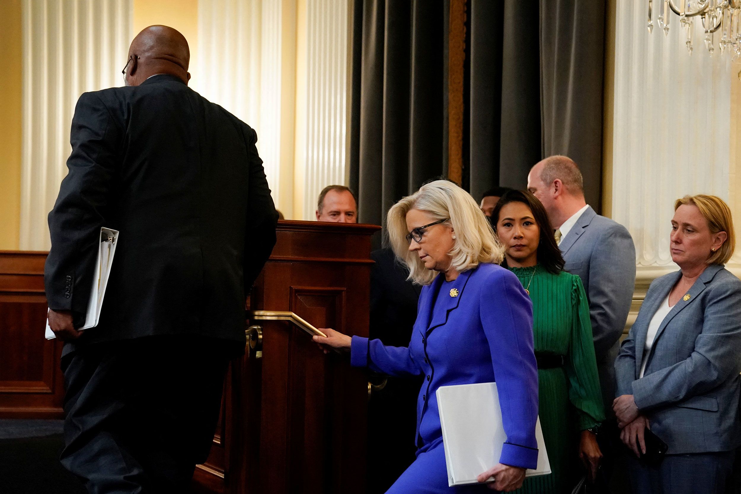 The committee members arrive for the June 9 hearing.