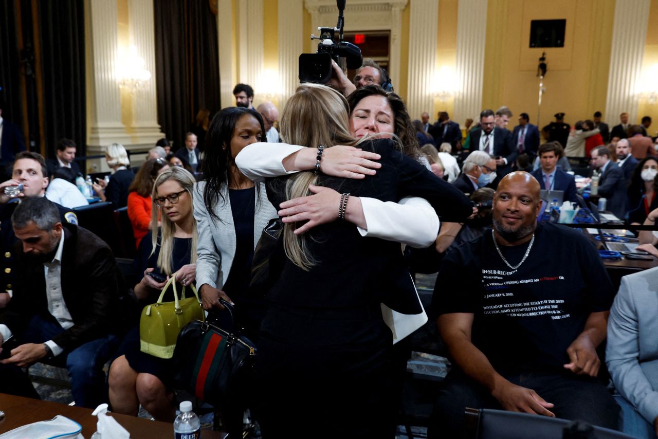 Capitol Police officer Caroline Edwards embraces Sandra Garza, partner of the late Capitol Police officer Brian Sicknick, after testifying on June 9. Sicknick suffered strokes and died of natural causes one day after responding to the attack on January 6.