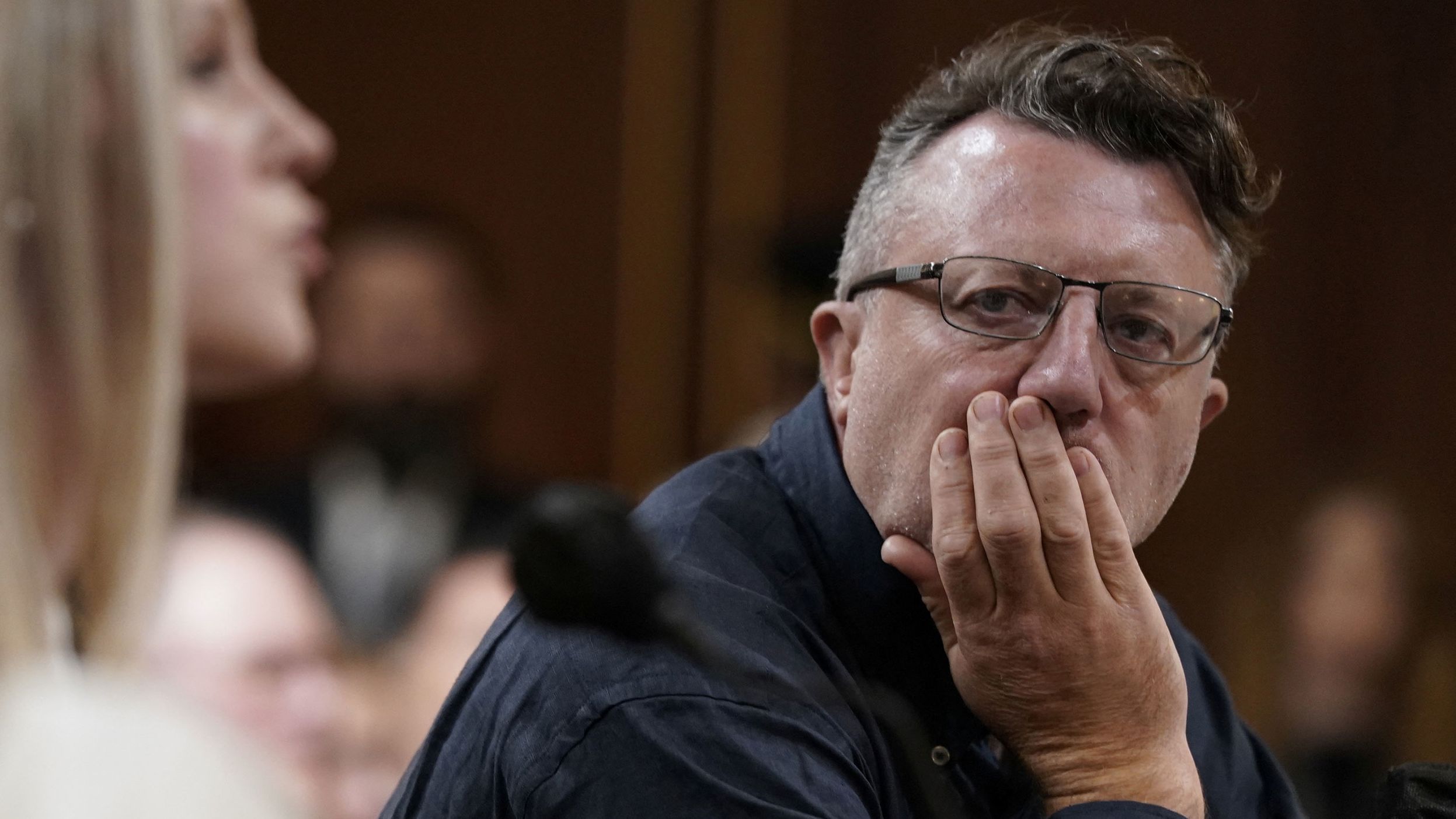 Quested watches Edwards' testimony on June 9.