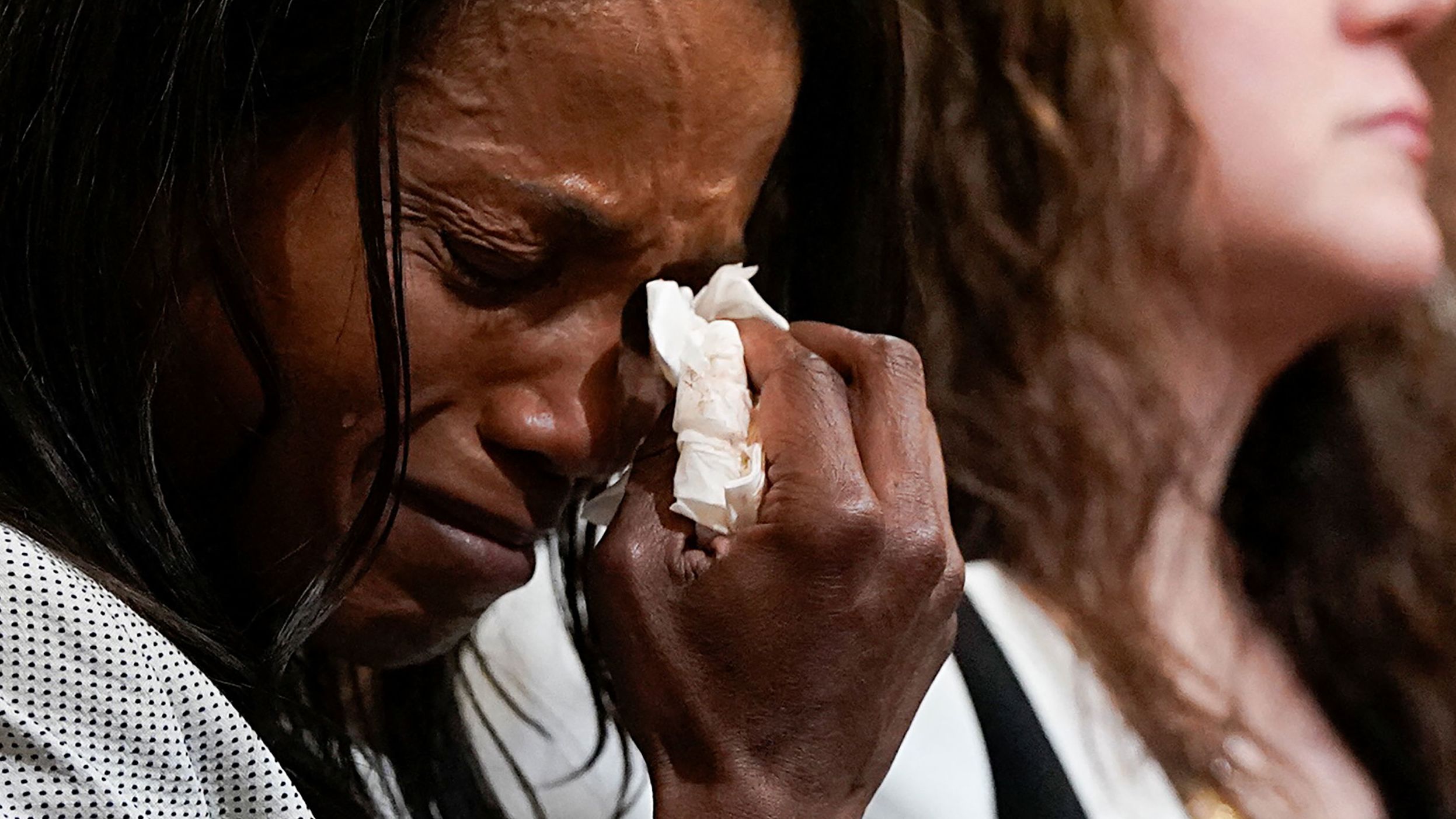 Serena Liebengood, widow of Capitol Police officer Howie Liebengood, cries as she attends the committee's hearing on June 9.