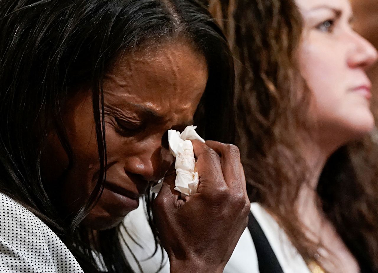 Serena Liebengood, widow of Capitol Police officer Howie Liebengood, cries as she attends the committee's hearing on June 9.