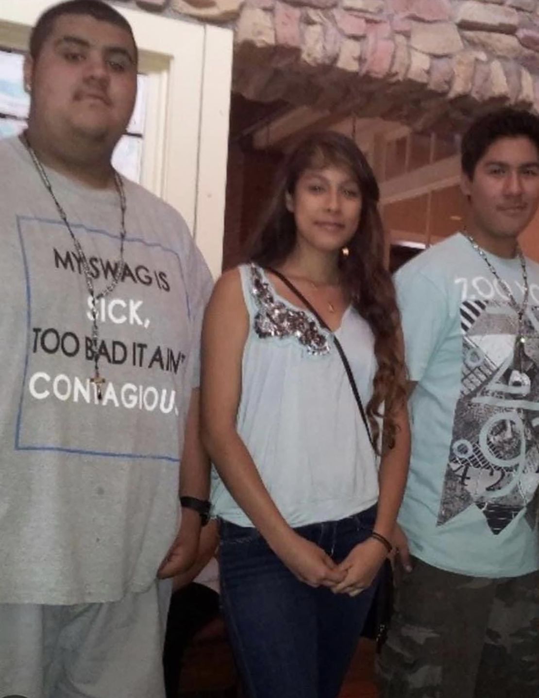 From left, Rafael Campos, Laura Buendia and Mariano Escareño were always together, family members say. 