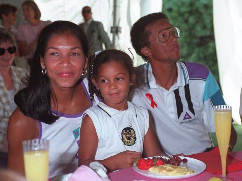 Ashe, his wife and his daughter attend the Arthur Ashe AIDS Tennis Challenge in 1992. That year, Ashe announced to the public that he had AIDS. It was thought that Ashe contracted HIV from infected blood transfusions during his heart operation many years before. He began campaigning to debunk myths about AIDS and the way it is contracted.