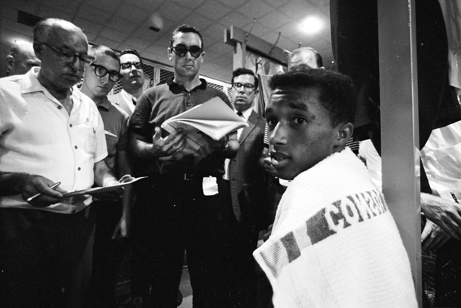 Ashe is interviewed by reporters at the US National Championships, now known as the US Open, in 1965.