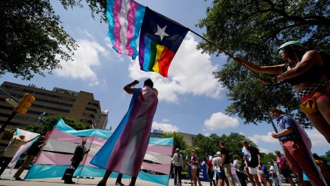 Demonstrators gather on the steps to the State Capitol to speak against transgender-related legislation bills being considered in the Texas Senate and Texas House on May 20, 2021, in Austin, Texas.