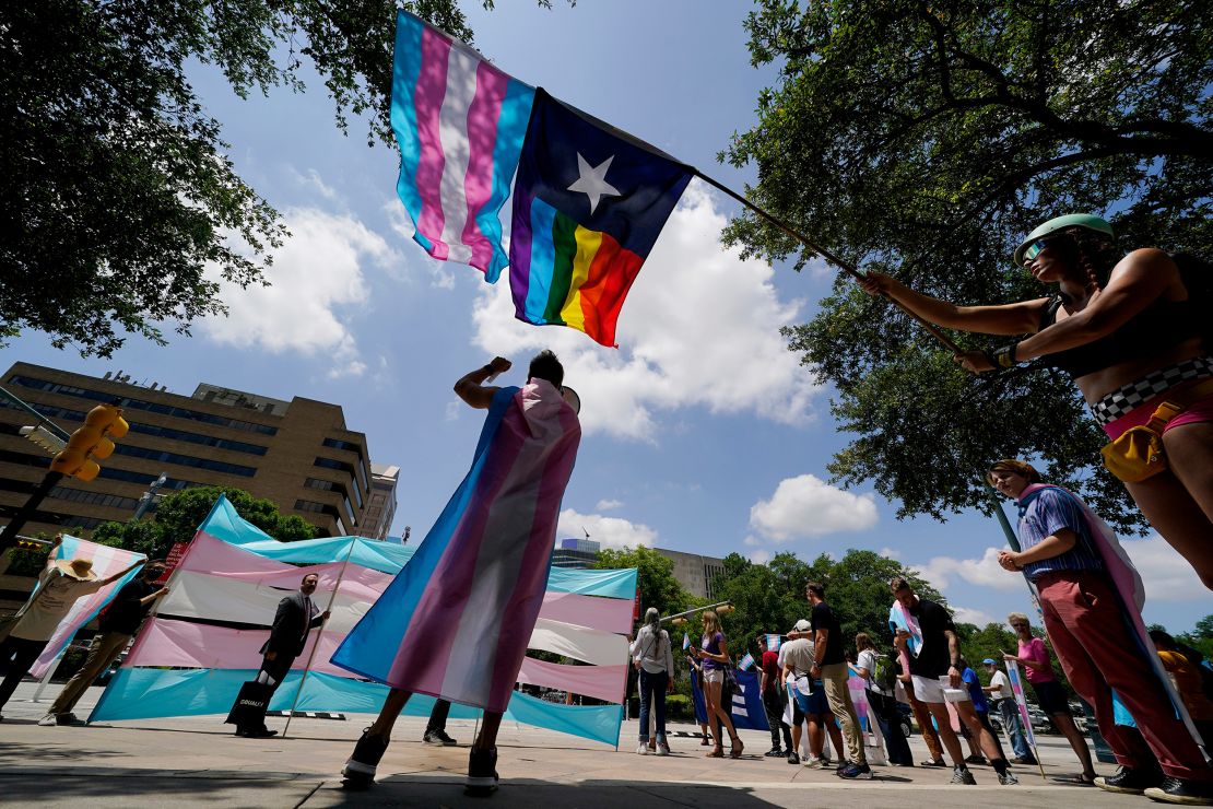 Demonstrators gather on the steps to the State Capitol to speak against transgender-related legislation bills being considered in the Texas Senate and Texas House on May 20, 2021, in Austin, Texas. 